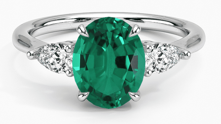 Lab created emerald and lab diamond ring