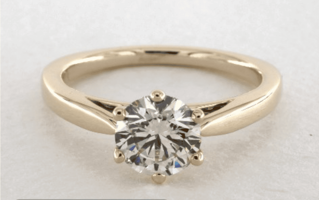 K color in yellow gold prong setting