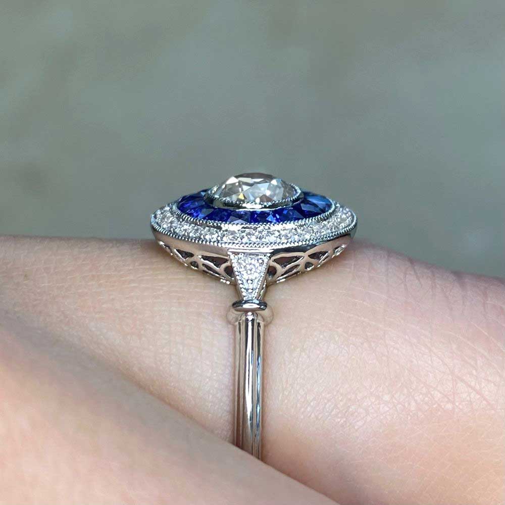 Bezel set 0-66 K color VS with blue sapphire halo