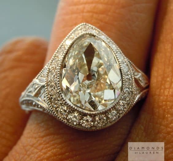 L color 1.88 ct pear shape VS1 in platinum halo setting